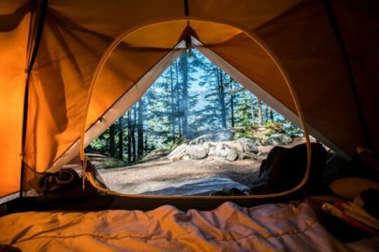Tent camping under the mountains